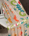 Off white Banarasi Paithani saree paired with an off white multi color thread work blouse