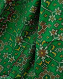 Pure Patola silk saree in a lovely shade of green and pink