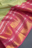 A dreamy kanjeevaram saree in a pastel green shade
