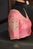 An exquisite Silk Saree in burnt orange and rose pink