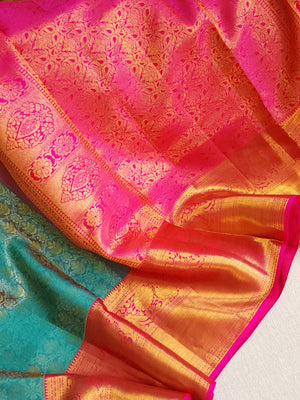 Turquoise Blue kanjeevaram saree with a contrast majenta pink border