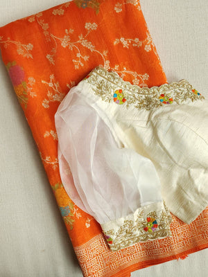 Deep Orange Munga silk saree with contrast off white puff sleeves blouse