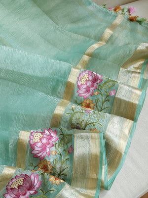 Sea Green Crush Tissue saree with a beautiful floral embroidered border