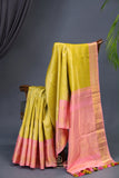 A dreamy kanjeevaram saree in a pastel lime shade