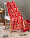 Red Banarasi Saree with a sleeveless blouse