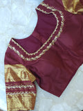 A stunning vintage kanjeevaram in rust orange with a deep maroon border