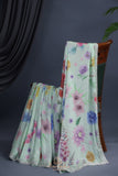 Mint Green Crepe Floral saree with hand worked border