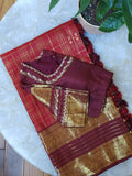A stunning vintage kanjeevaram in rust orange with a deep maroon border