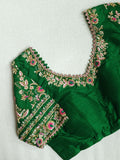 A stunning blouse in leaf green color with beautiful embroidery