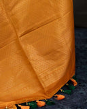 Kanchi soft silk saree in an evergreen green and light orange combo