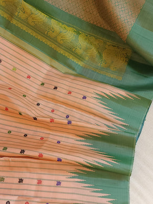 Gadwal saree in peach with beautiful contrast green temple borders