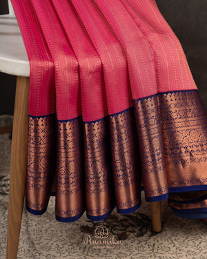 Kanchipattu saree in lovely rose pink shade with a contrast dark blue border