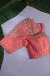 Green Kanjeevaram saree with a peach pink border