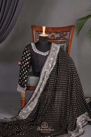 A graceful black Georgette saree with stylish full sleeves blouse