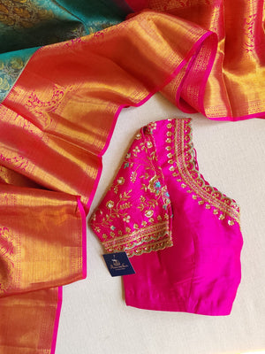 Turquoise Blue kanjeevaram saree with a contrast majenta pink border