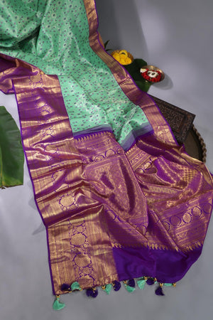 Mint Green Kanjeevaram saree with a purple border