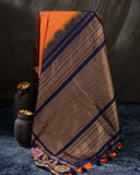 Regal Orange Gadwal Pattu Saree with Handcrafted Kalamkari Appliqué Border