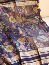 A purple Kota silk saree with beautiful floral prints