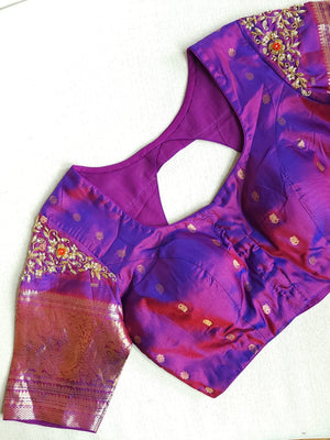 A grand Gadwal Kanchi saree in orange for your joyous occasions