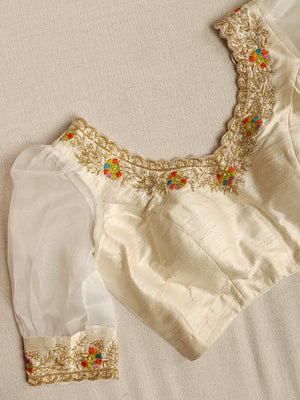 Deep Orange Munga silk saree with contrast off white puff sleeves blouse