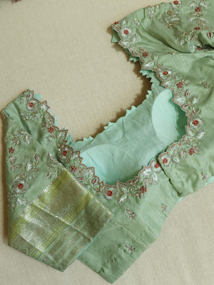 Kanjeevaram saree in a unique combo of maroon and mint green