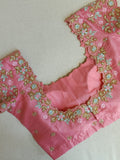 Multi colored pink hued Georgette saree with sequins border