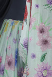 Mint Green Crepe Floral saree with hand worked border