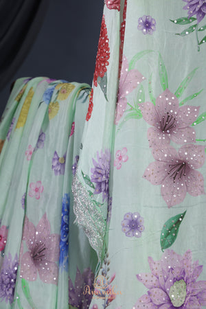 Mint Green Crepe Floral saree with hand worked border