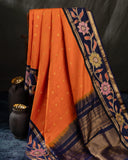Deep orange Gadwal saree with handcrafted kalamkari appliqué work Border