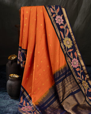 Deep orange Gadwal saree with handcrafted kalamkari appliqué work Border