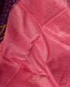 A purple kanchi soft silk saree with peach pink border