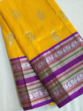 Venkatagiri Pattu saree in yellow with a contrast purple blouse