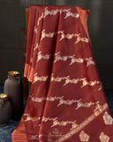 Rust Organza saree paired with a floral blouse