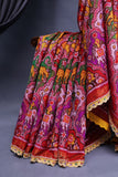 Patan Patola saree with intricately designed maggam work border