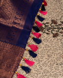 Kanchipattu saree in lovely rose pink shade with a contrast dark blue border