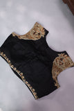 Black Bandini Gharchola saree with a showstopper blouse patter