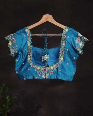 Dark blue blouse with intricate cutwork embroidery