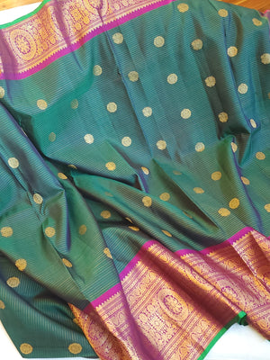 Peacock Green Gadwal Kanchi Saree with a magenta pink border