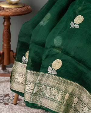 Banarasi Organza Saree in dark green with a floral blouse