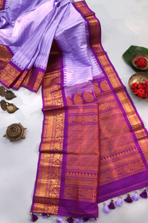 Timeless Gadwal Pattu saree in lavender and plum combo