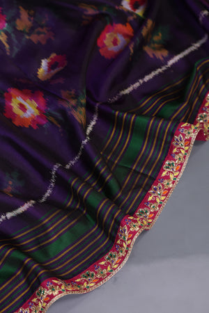 A classic patola in purple with a striking border