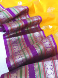 Venkatagiri Pattu saree in yellow with a contrast purple blouse