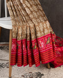 Twill Patola saree in a lovely shade of light brown and red