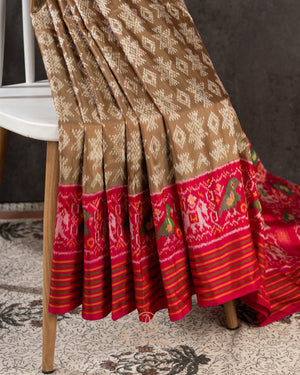 Twill Patola saree in a lovely shade of light brown and red