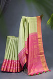 A dreamy kanjeevaram saree in a pastel green shade