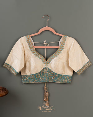 Pastel Blue banarasi silk saree with contrast off white work blouse