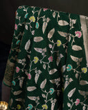 Banarasi Silk Saree in a dark emerald color