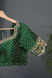 Dark green blouse with heavy embroidery work