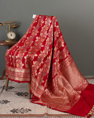 Red Banarasi saree with a heavy bridal zardosi work blouse