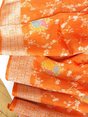Deep Orange Munga silk saree with contrast off white puff sleeves blouse